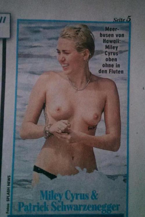 Miley cyrus topless beach