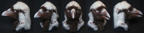 A copper crow! Resin base, articulated jaw, faux fur with feather accents. Based loosely on an odd b