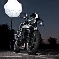 thatyouride:   	Triumph Speed Triple by Marco Glasbergen    	Via Flickr: 	Strobist setup for photographing my Triumph Speed Triple. I used three 580EX flashes in total: one in an umbrella and two bare strobes on each side of the bike (one of which didn’t
