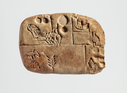 Sumerian cuneiform tablet (c. 3100 – 2900 BC).  Administrativeaccount recording the distribution of 