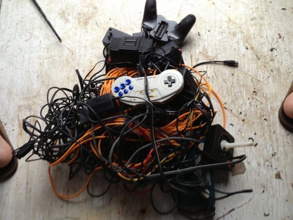 dorkly:  Epic Controller Tangle The next time you complain about not being able to
