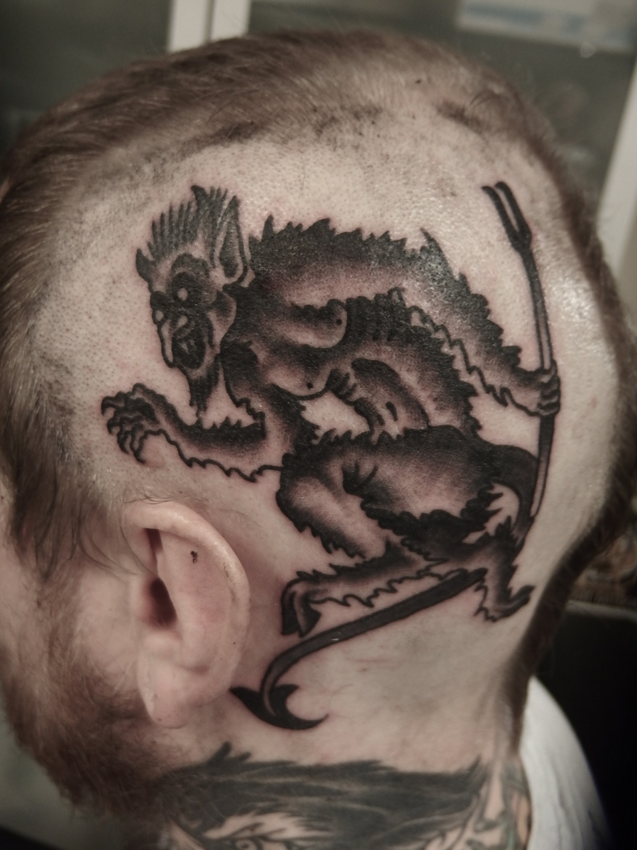 Tattoo of an angel whispering in the ear for the back of the neck small  tattoos with devil wings for guys