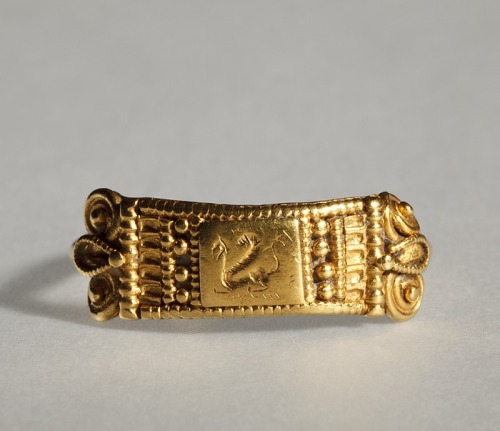 ancientjewels:Gold Etruscan ring featuring incised griffin image c. 6th century BCE. From the collec