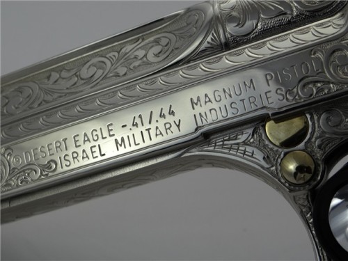 cavalier-renegade:  gunrunnerhell:  Desert Eagle Custom engraved Desert Eagle in .44 Magnum, it is accented with 24K gold on several parts throughout the gun. The engraver, Santiago Leis, is one of the most famous engravers in the gun community. It’s