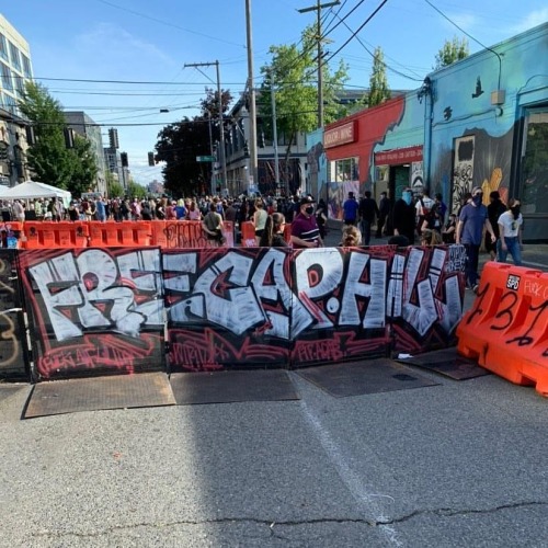 “Free Cap Hill” barricade around the Capitol Hill Autonomous Zone in Seattle, Washington