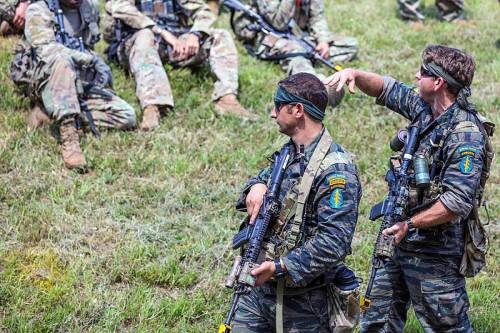 5th Special Forces Group dawns beautiful vintage tiger stripe camo for exercise.