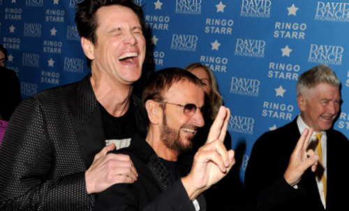 jimcarreying:  Jim Carrey’s shirt, which replaces the faces of George Harrison and Paul McCartney with Lloyd Christmas and Harry Dunne is photobombed by Ringo Starr at the David Lynch Foundation’s Lifetime of Peace & Love Award 