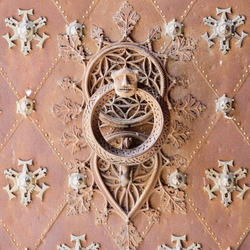 Wrought iron door-knocker in the main gate of the Western façade of the Cathedral in Tarragon