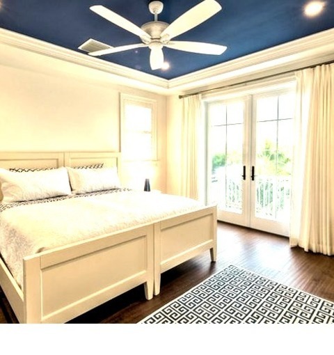 Transitional BedroomInspiration For A Sizable Transitional Guest Bedroom Remodel With A Dark Wood Floor