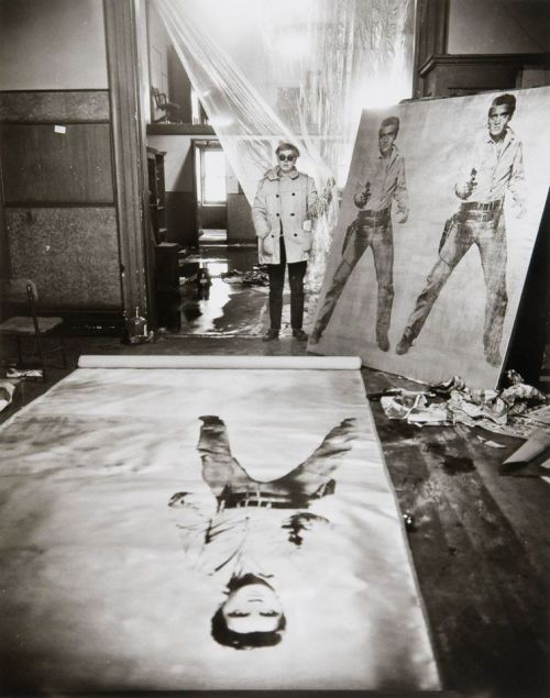 Andy Warhol (in his Studio with Elvis Presley Print) by Evelyn Hofer, New York, 1962