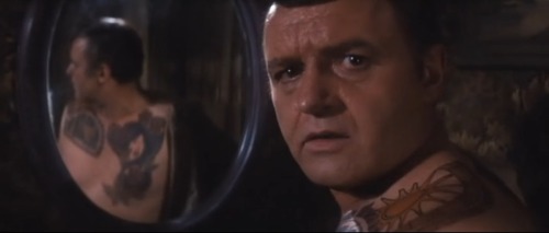 The Illustrated Man (1969) - Rod Steiger as CarlEven though I hate a lot of tattoos (Excuse me, skin