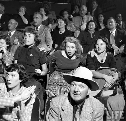 Fans react to a jai alai game(Loomis Dean. 1950)