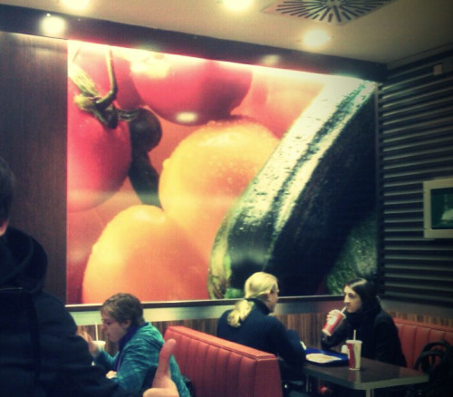 I took this snapshot with my phone the other day… This is the wall decor of our McDonalds… Somehow that yellow pepper looks like a very yellow ass from above. The stem makes it look like it’s getting a hard ass fucking by a black cock&