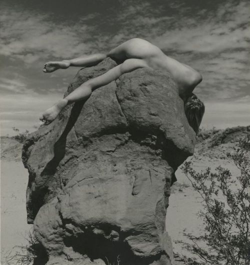 hauntedbystorytelling: André de Dienes :: Female nude on rocks, view from behind, unknown dat