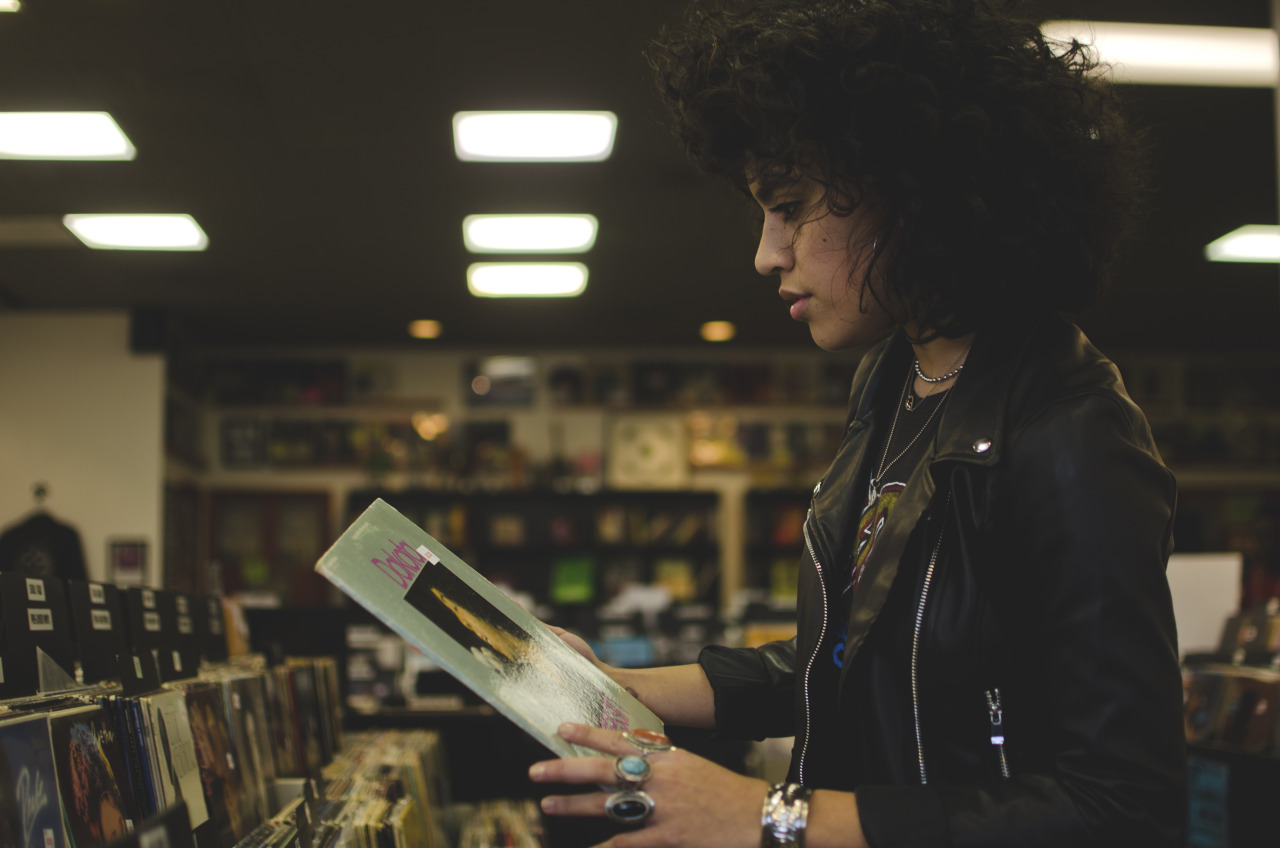 johnjuiceharris:  kicking it old school with bianca as she shops for vintage records.