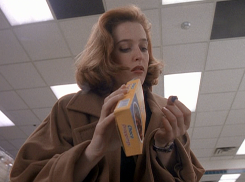 ursulastrausss:Scully looking good while eating choco droppings.