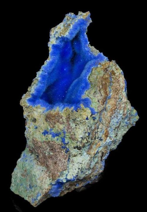 CyanotrichiteBeautiful blues like this one are almost always induced by copper, in this case as a su