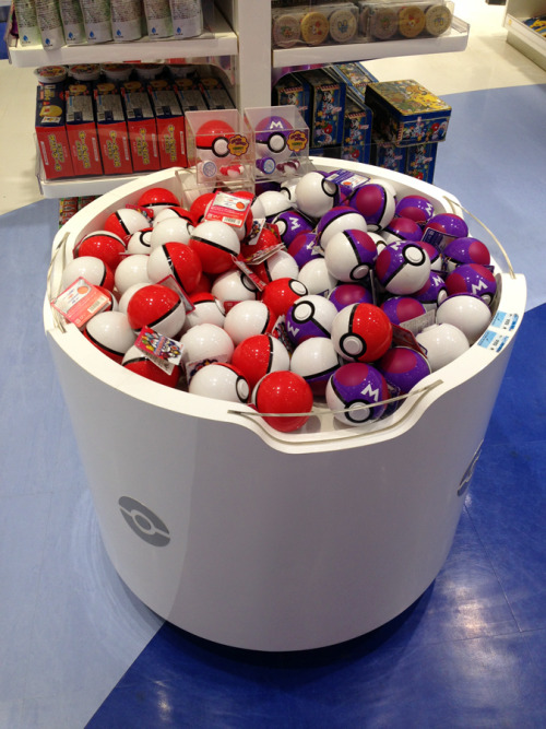 zombiemiki:  Pokeballs for sale at the Tokyo Bay Pokemon Center Larger Masterballs have 3 random Pokemon Kids figures and 1 random badge from a total of 12 designs. The smaller Pokeballs have 1 random stamper and hard candy. 