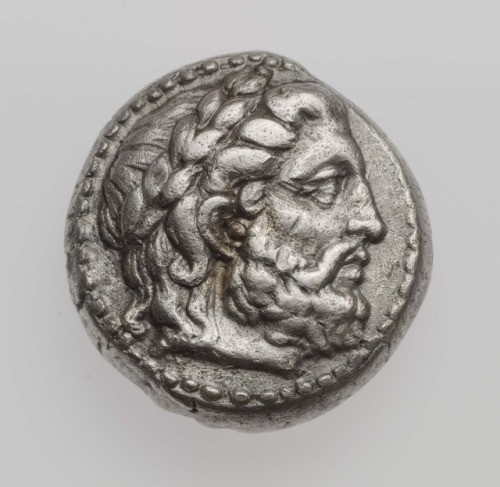 Stater of Kingdom of Syria with laureate head of Zeus (obverse) and elephant with spear above (rever