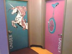 andythenerd:  Two unisex restroom doors, one painted with a unicorn, the other with a unicycle. Cute as hell.  