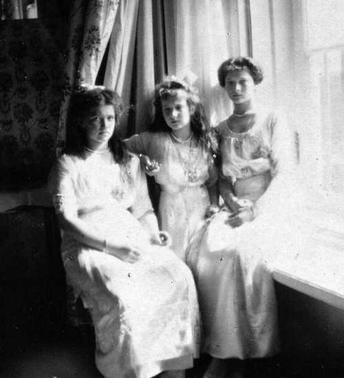 Grand Duchesses Olga, Tatiana, Maria and Anastasia taking a few informal pictures while still dresse
