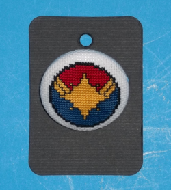 chujo-hime:   I’ve moved to a bigger and better online store and to celebrate, I’ve add a ton of new buttons!  First off is a button dedicated to my favorite new series of 2012- Captain Marvel. And to go along with Carol’s button are two pairing