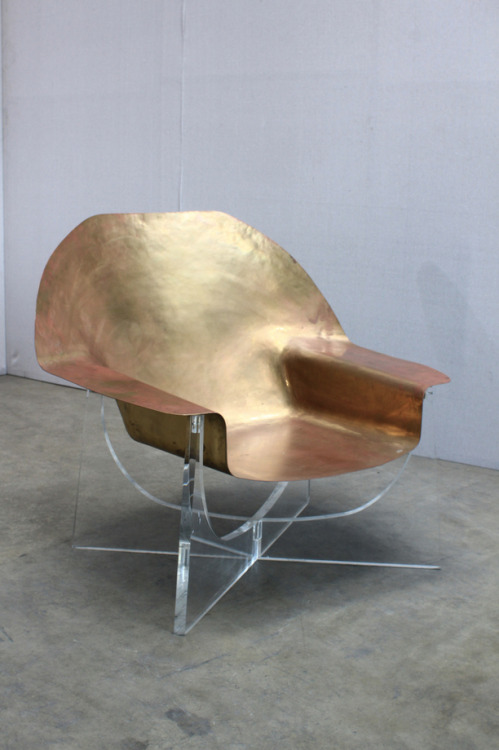 Beaten Brass Chair with lucite base by Philippe Hiquily. France, c. 1970. This chair is the first in