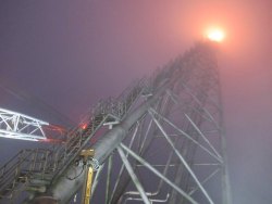 evilbuildingsblog: Stairway to hell - flare on my oil rig in the fog
