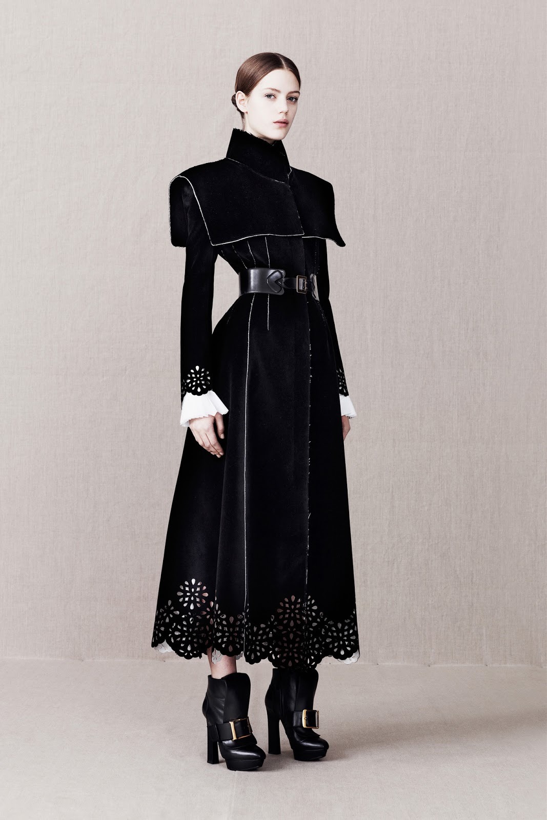 gothiccharmschool:  The black &amp; white coat! Lots of interesting, pretty designs