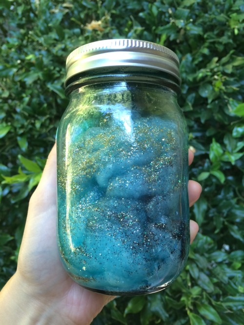 lazynature:  a girl I babysit made this cool “galaxy in a jar” at summer camp :^) 