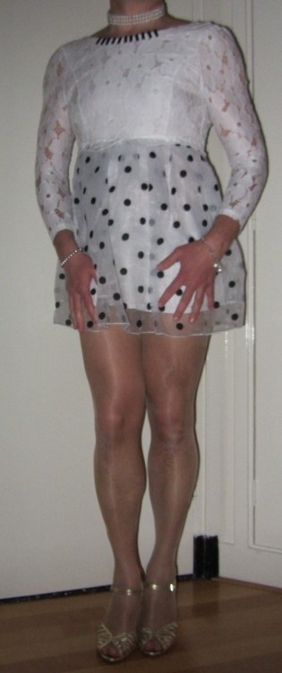 Me Cindy Cross crossdressing in a new white dress: a lace top with a black dotted white frilly skirt