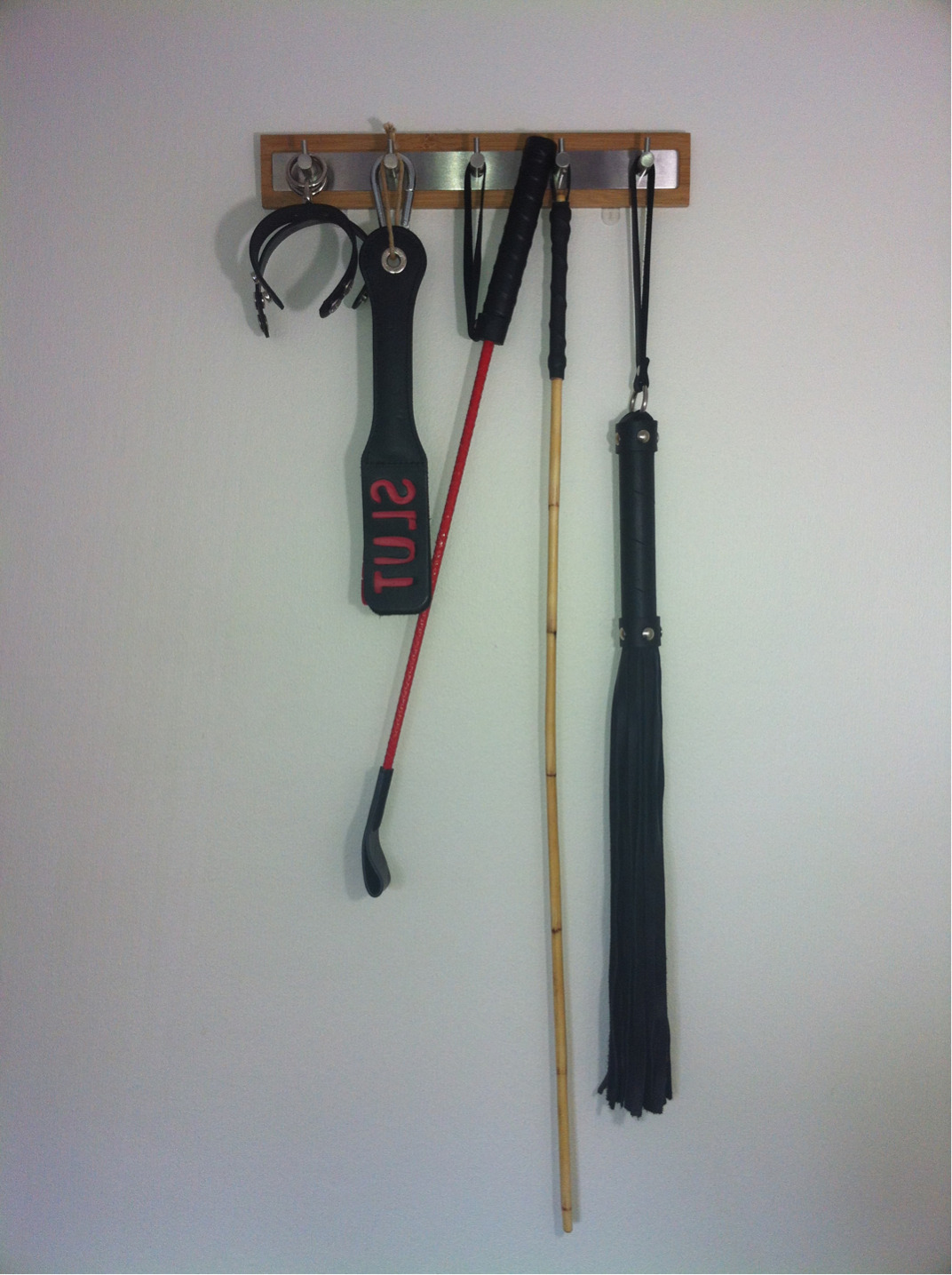 My new wall rack for my favorite toys! Conveniently located next to my bed :)