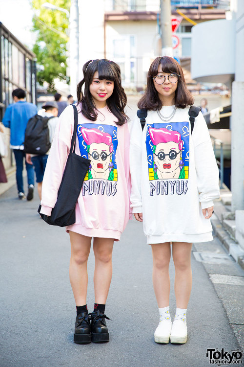 Haruna and Ayaka on the street in Harajuku wearing matching sweatshirts by the Japanese brand Punyus
