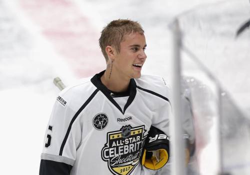 Canadian pop star Justin Bieber plays in the 2017 #NHLAllStar celebrity exhibition game at the Stapl
