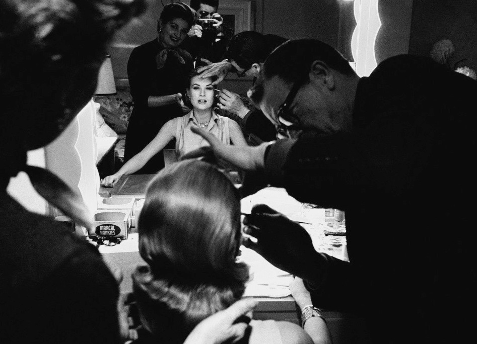 summers-in-hollywood:Grace Kelly having her makeup done on the set of High Society,