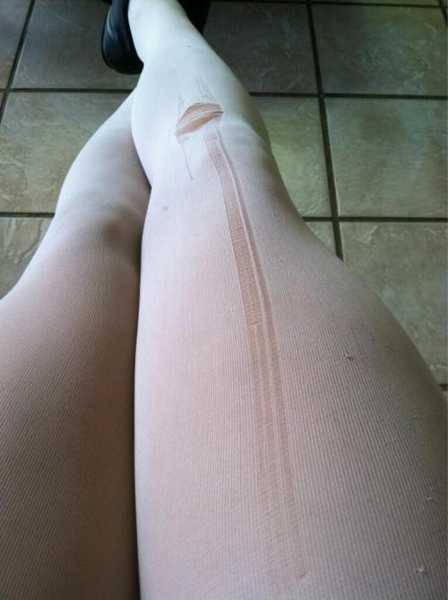 Laddered white tights