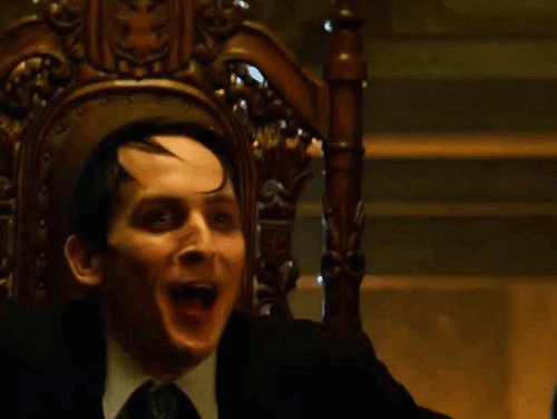 jim walks into oswald's home and oswald stands up, smiling while saying 'jim!'