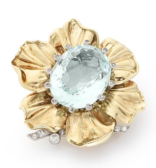 An aquamarine and diamond flower clip, by Cartier, circa 1950 (Bonhams.com)