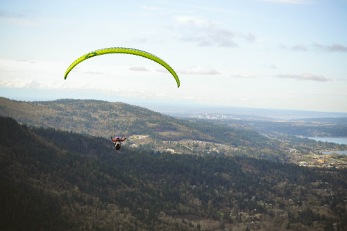 {There is nothing more fun than being rewarded at the end of a hike with the sight of paragliders ta