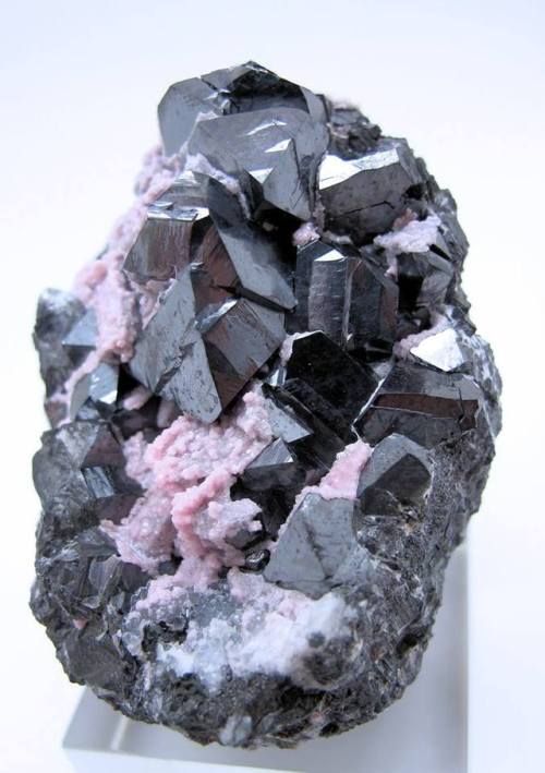 AlabanditeThe dark octahedral black crystals are a rare manganese sulphide that in the case of the 6