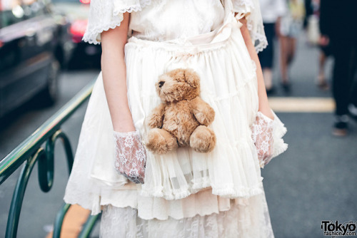 Japanese students Kasumi and Teiyu on the street in Harajuku wearing vintage and antique styles with