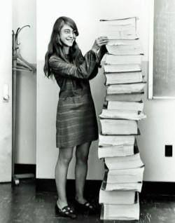 sixpenceeeblog:   Margaret Hamilton standing next to books of code she wrote for Apollo 11.