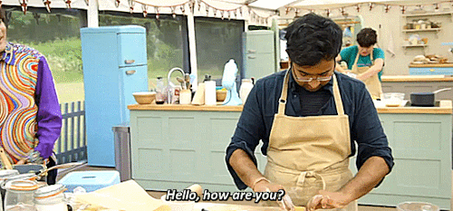 nonbinarywithaknife:ID: Two gifs of Noel and Rahul on Bake Off. In the first, Noel walks up to Rahul