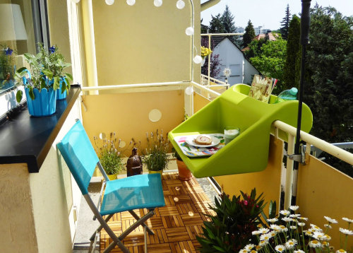 odditymall: The BalKonzept is a German designed desk for your balcony. Just place it over the railin