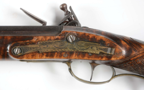 Flintlock long rifle crafted by Melchior Fordney of Lancaster, Pennsylvania, early 19th century.from