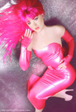 hypnozzz:  born-inlatex:  Latex  Pink, shiny and distant stare…   she looks so pretty!!