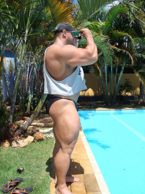 hotbodybuilders:  muscle-bear-corp:  bighugeguys:  Marcelo De Paula by the pool. Sculpted.   Muscle Bear Corp. — http://muscle-bear-corp.tumblr.com/  Love LOVE! This man  Stunning body - WOOF