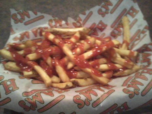 My dinner today, finished that first plate in 10 minutes.  3lb burger, and three orders of fries.  With a glass of Devil’s Backbone Schwartz Bier to wash it down.  Later I had a bowl of ice cream, and two big pb&j sandwiches.  So I’m feeling