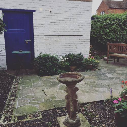 The garden of our girly cottage from the weekend. #heacham #cottage #garden #bluedoor #weddingweeken