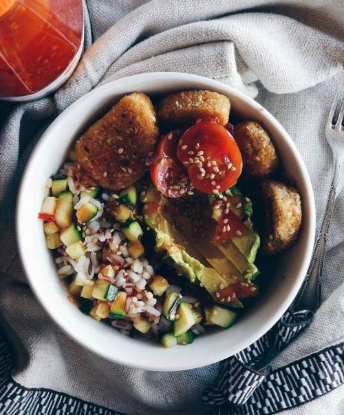 Trying new flavours - Lunch today was wild ruce with vegan nuggets, avocado, zucchini, tomatoes, ses